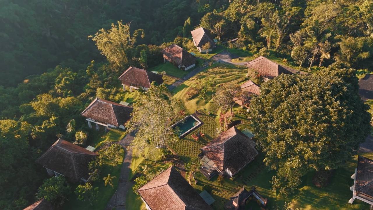 Top-down aerial of the estate villas and pool